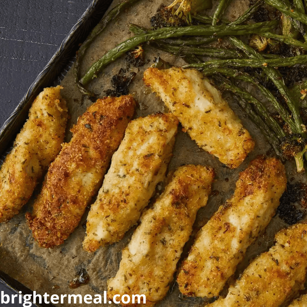 Indulge in the savory symphony of Parmesan-coated chicken and a medley of roasted vegetables. This easy sheet pan recipe offers a quick and delicious dinner solution, perfect for busy evenings. Elevate your homemade cooking with this nutrient-rich, family-friendly delight