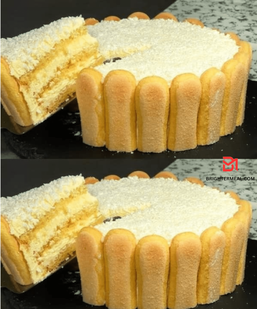 Image: A beautifully decorated lemon cake with a lemon glaze, topped with fresh lemon slices and berries